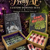 Pretty AF custom resin domino sets in Witchful Thinking and Grave Matters book boxes